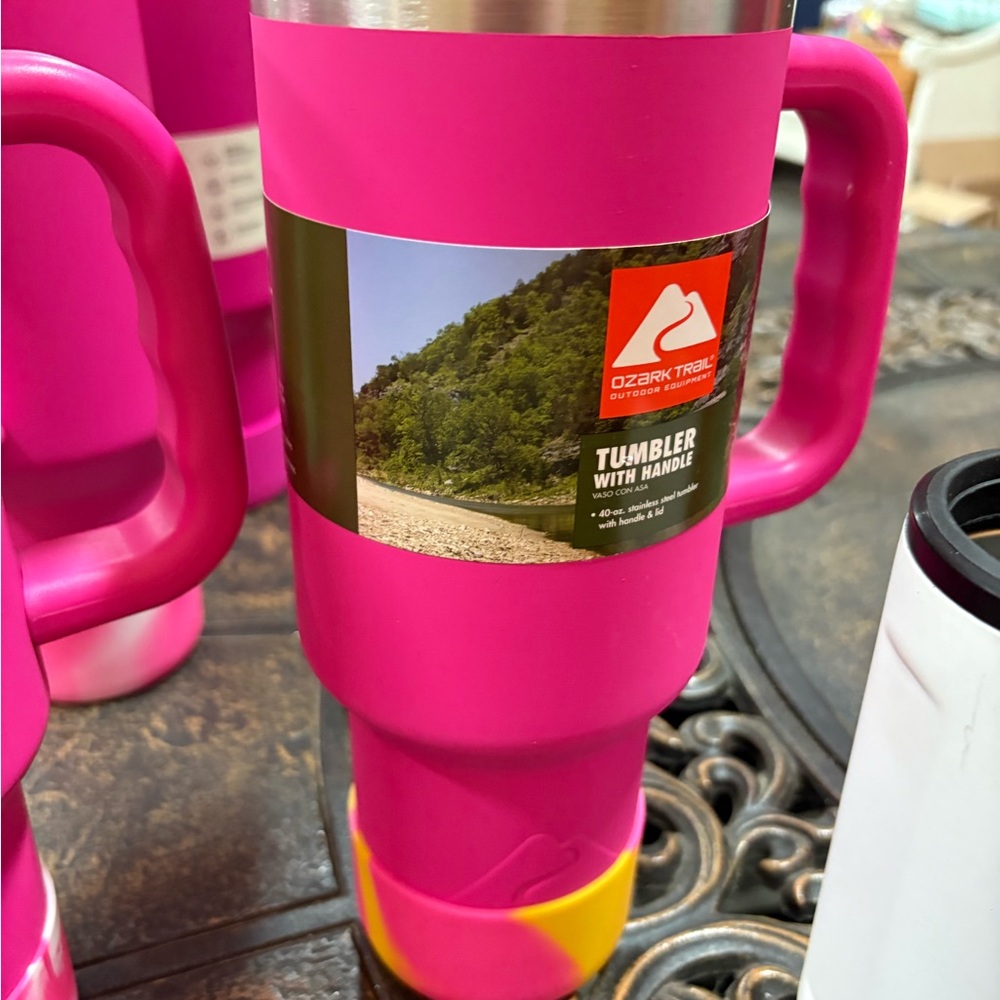 Ozark trail 40 oz. Insulated tumbler in ozark trails bright pink, both are new.